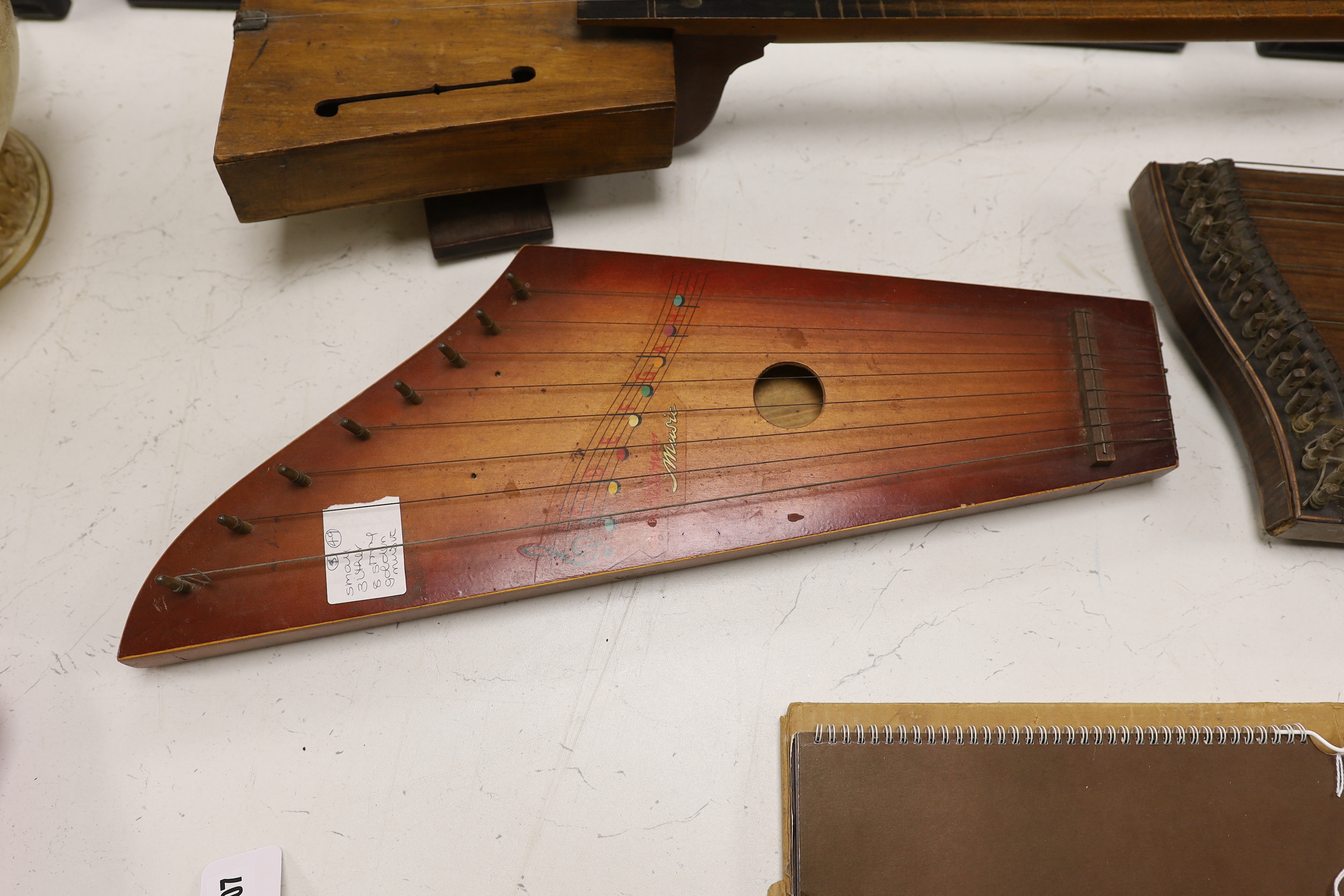 A single string fiddle, a zither and a Golden Music zither